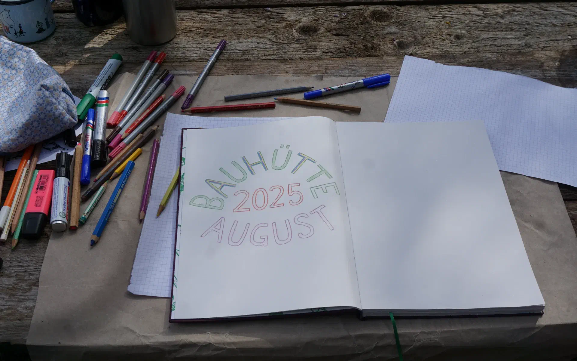 The guestbook lies open on the table. It is ready to be filled with entries.