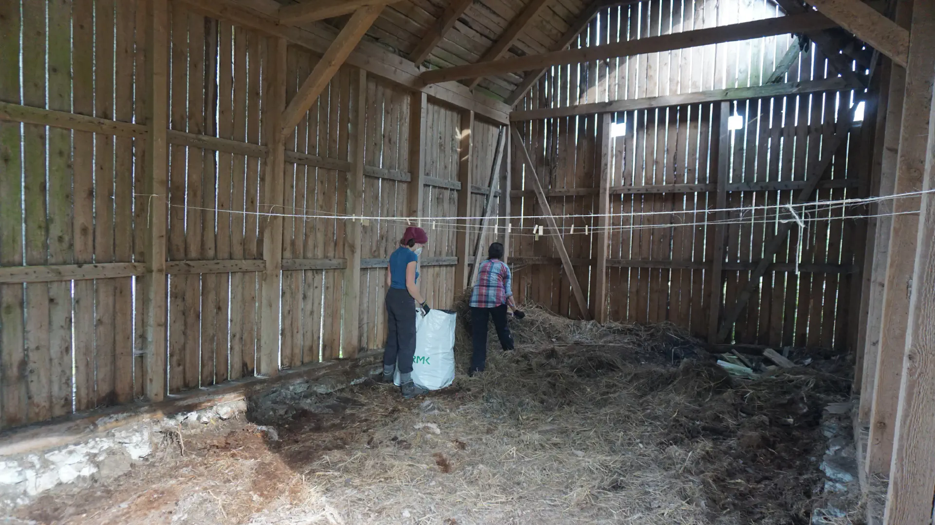 The barn from the inside, already half cleared of hay