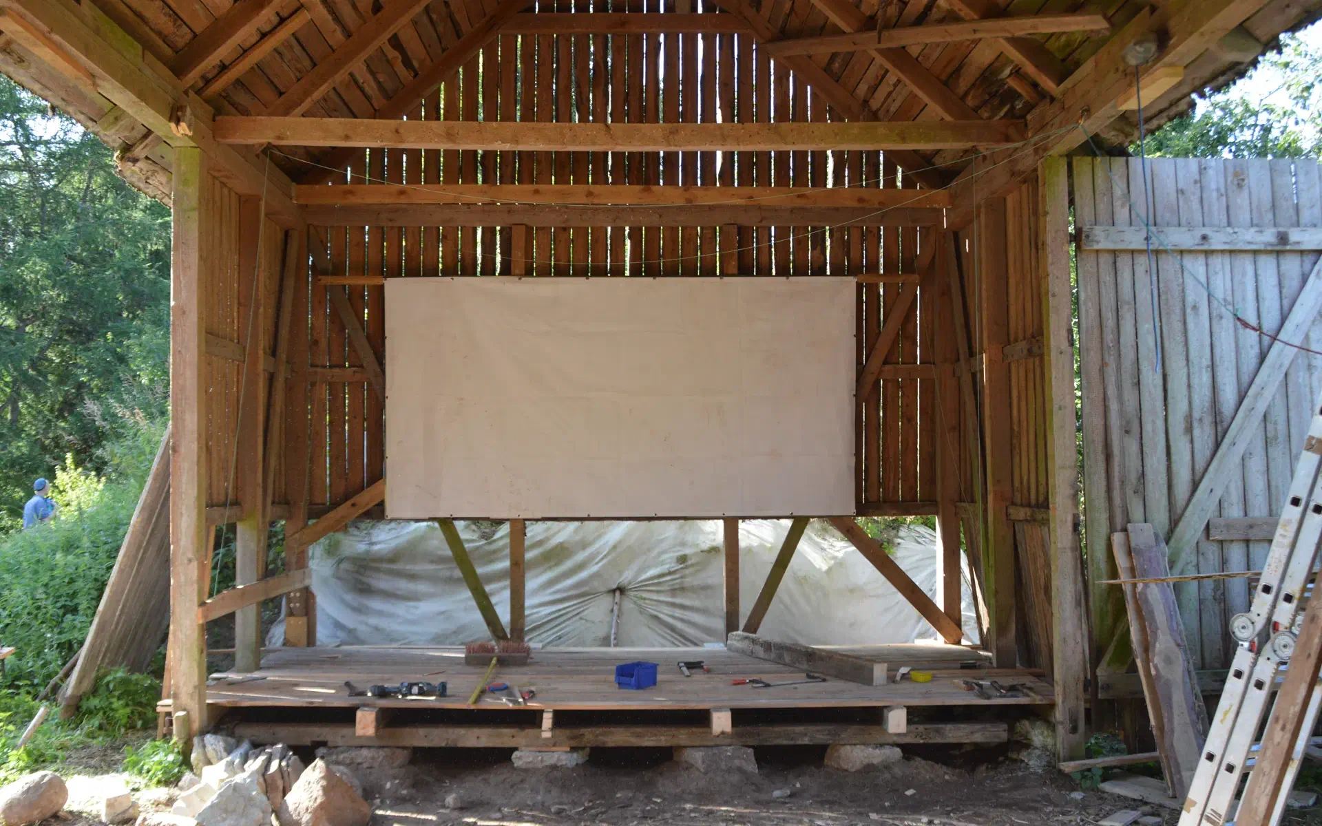 A wooden floor now lies on top of the basic framework of beams.