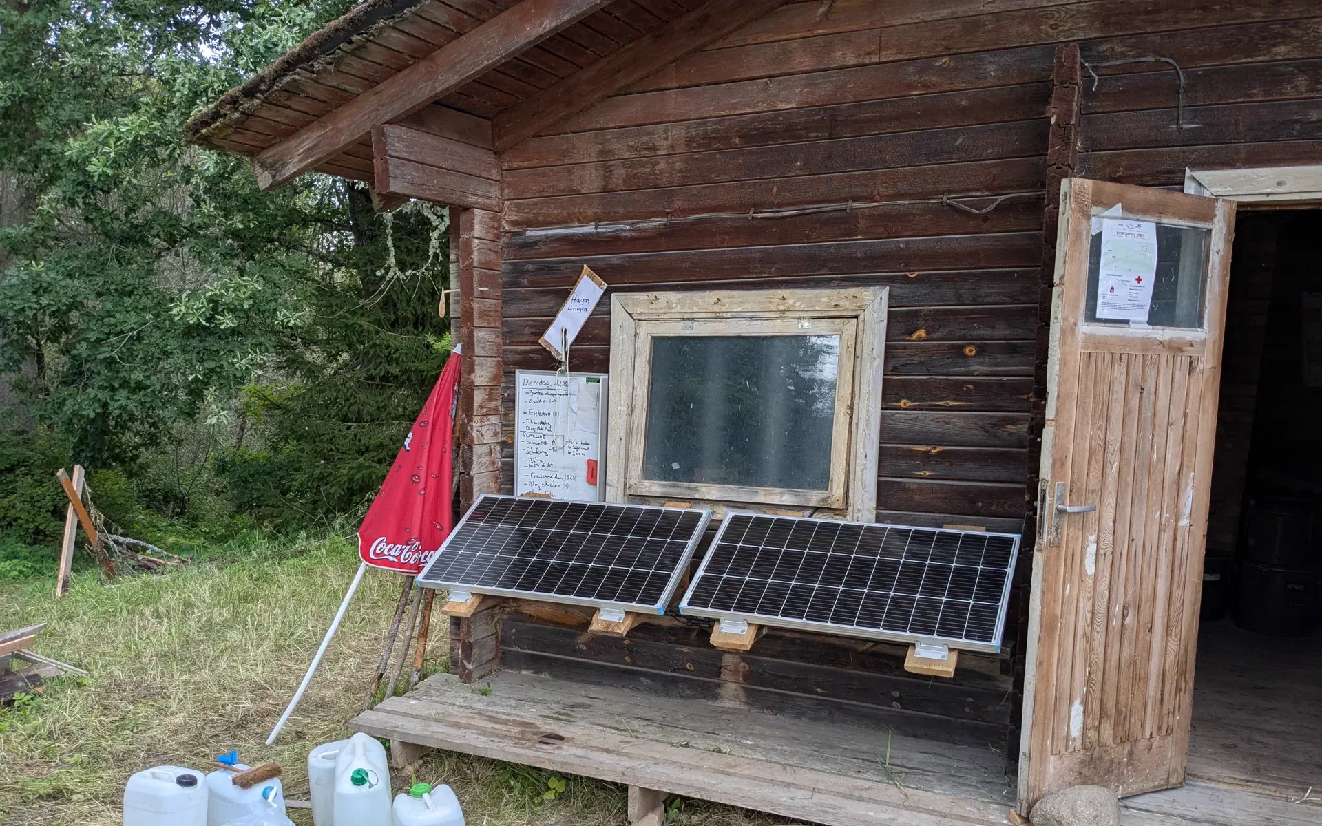 Two solar panels are installed under the kitchen window.