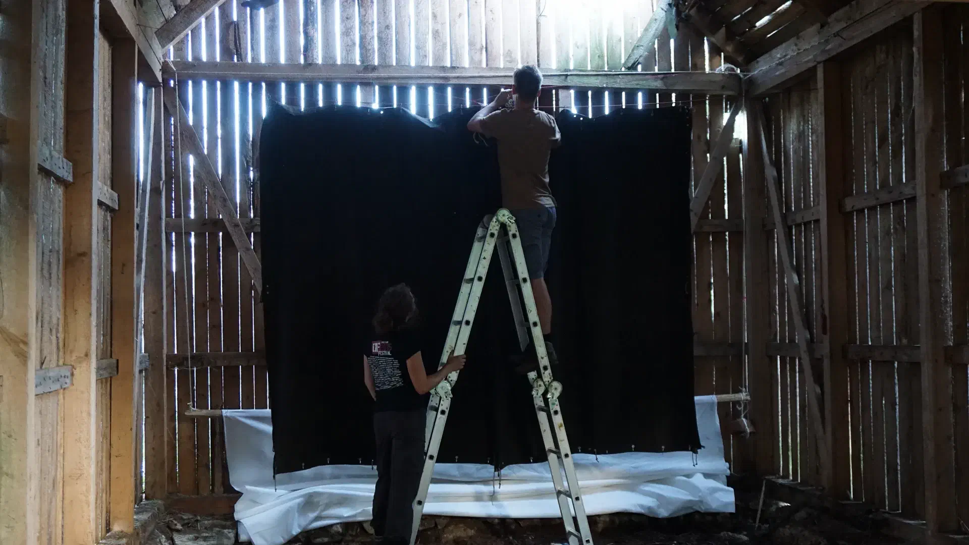 Hagen and Stella work on the autmatic theater curtains
