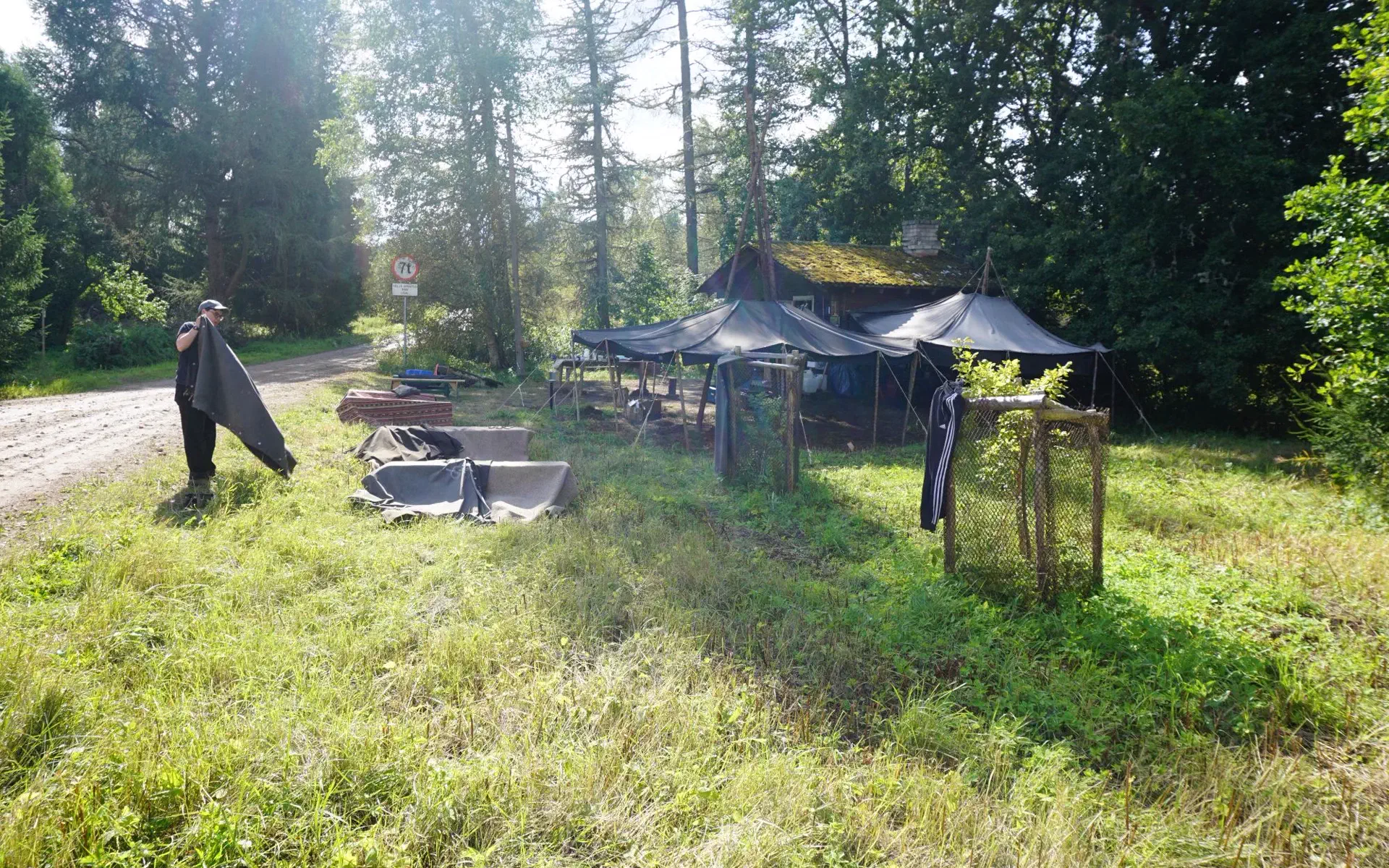 Janne lays out the side panels of the yurt to dry.