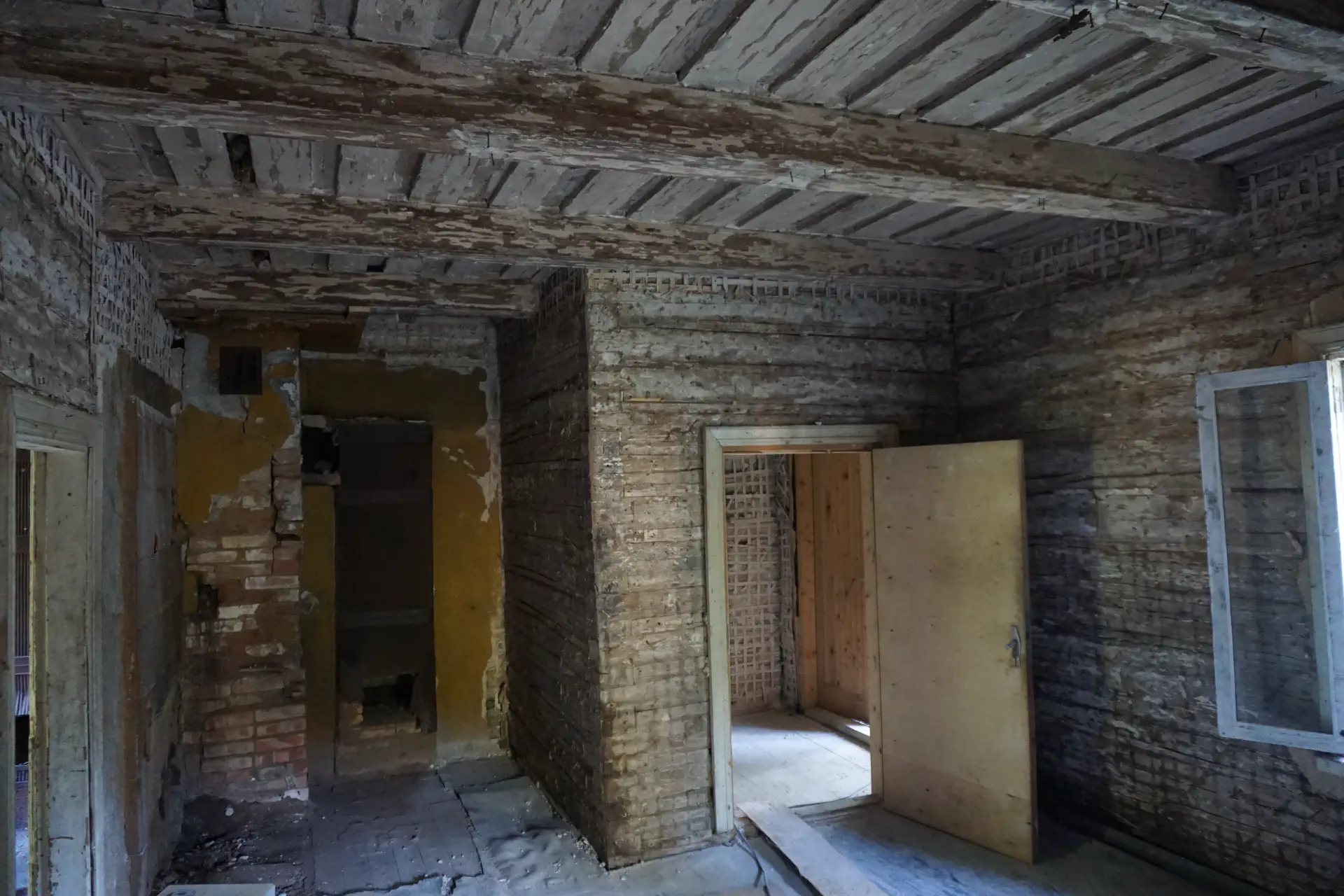 Even the hallway of the main house is now completely without plaster