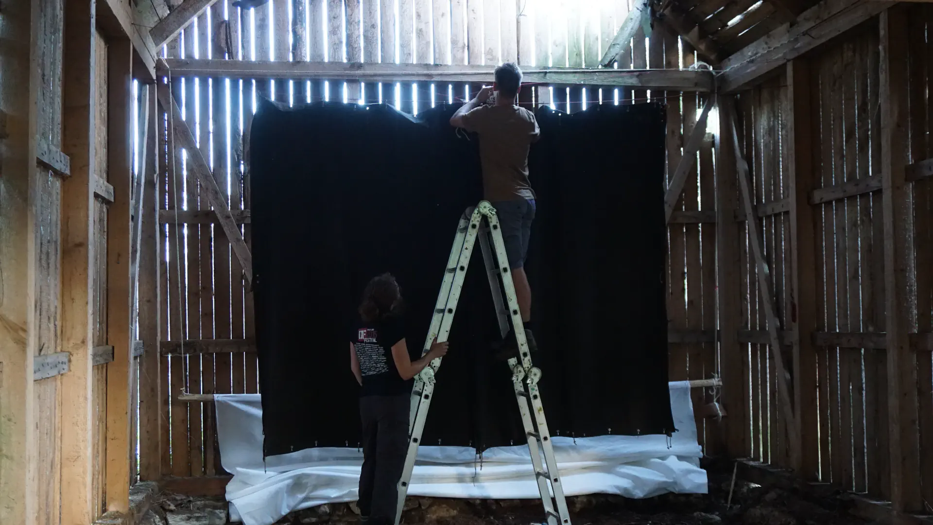 Hagen and Stella work on the autmatic theater curtains